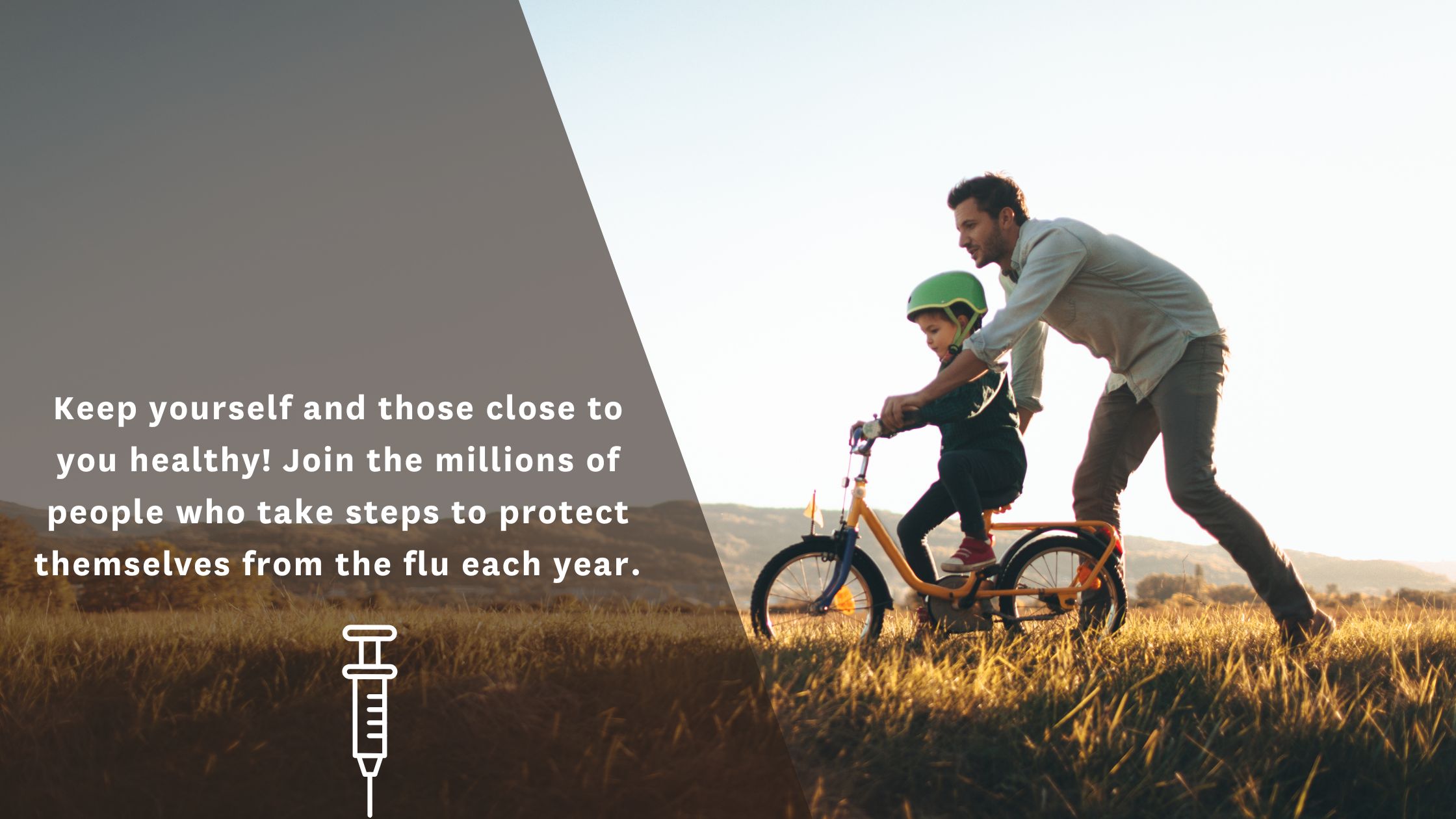 Boy riding bike with Father's help